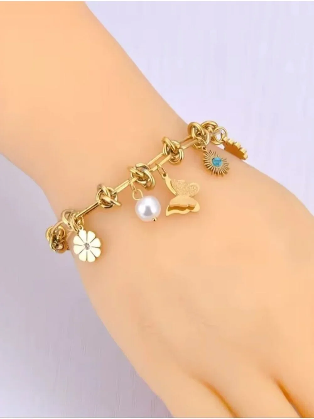 Gold Charm Link Bracelet with Butterfly, Daisy & Pearl Charms | Stainless